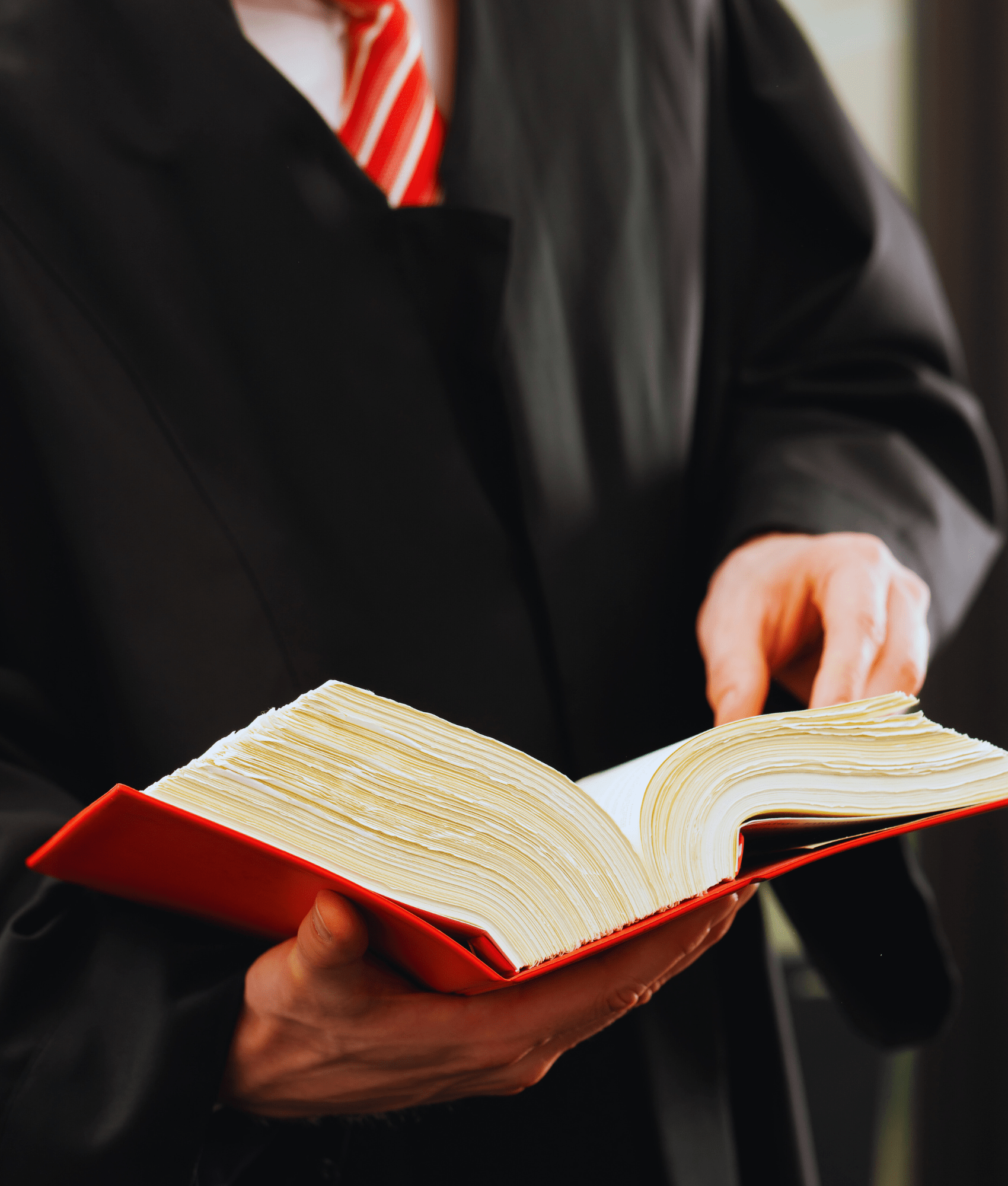 Judge holding open the legal book